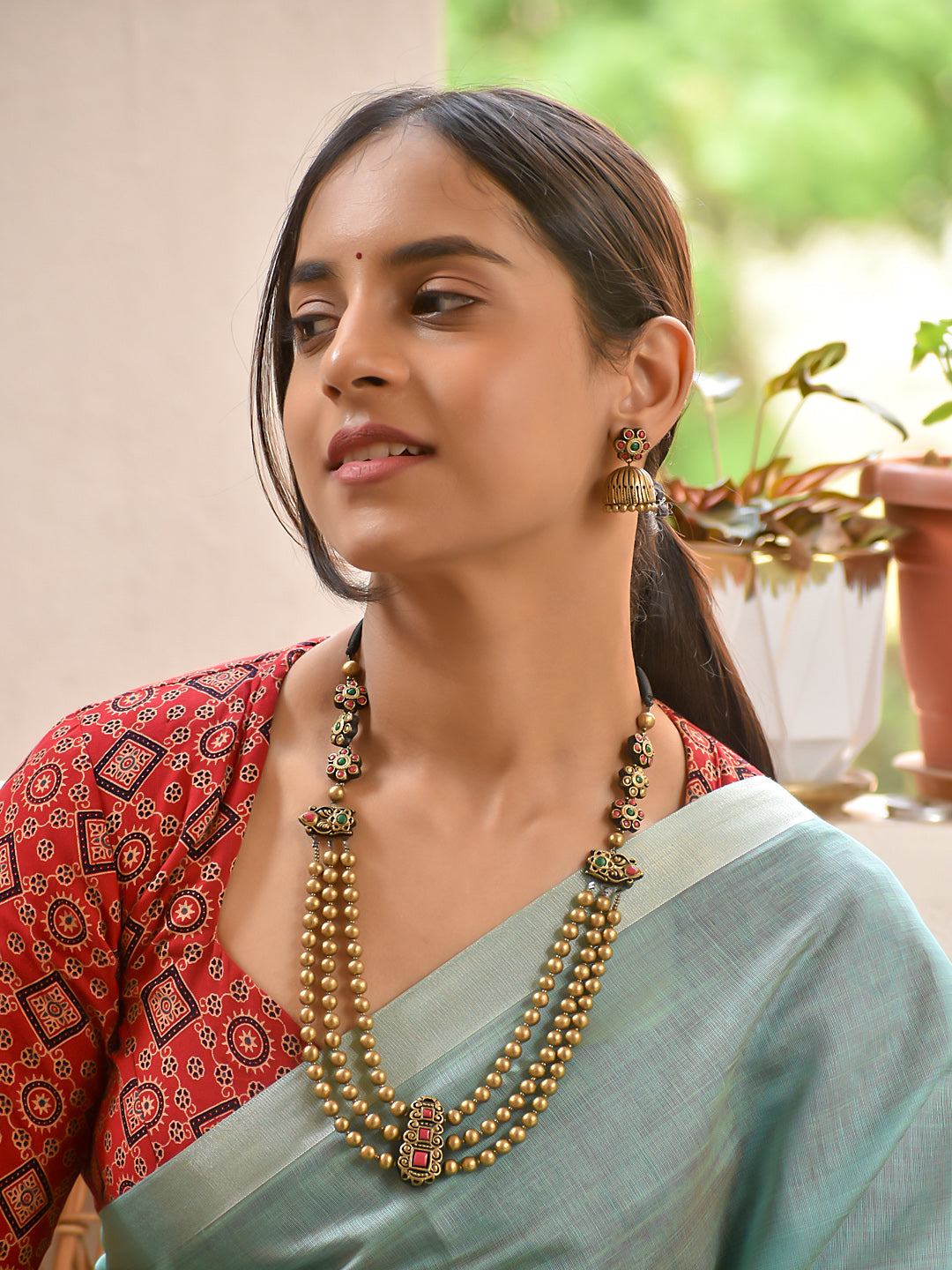 Terracotta Multi-Layer Bead Necklace with Floral Motifs