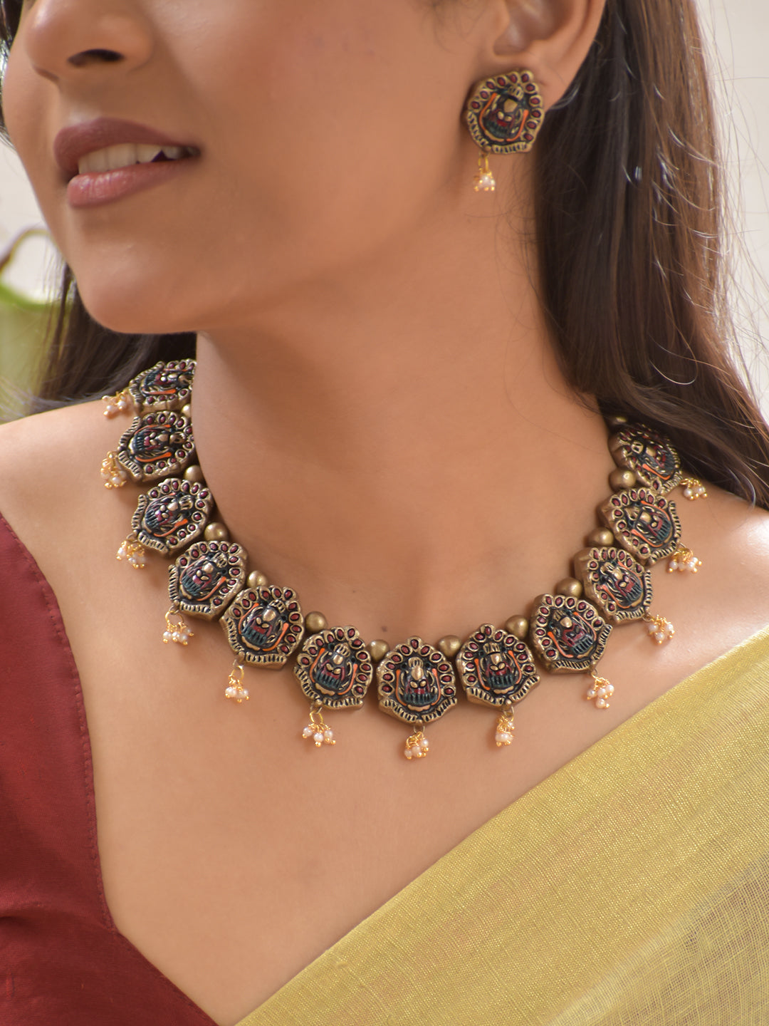 Terracotta Antique Gold Lakshmi Motif Necklace with Bead Drops & Earrings