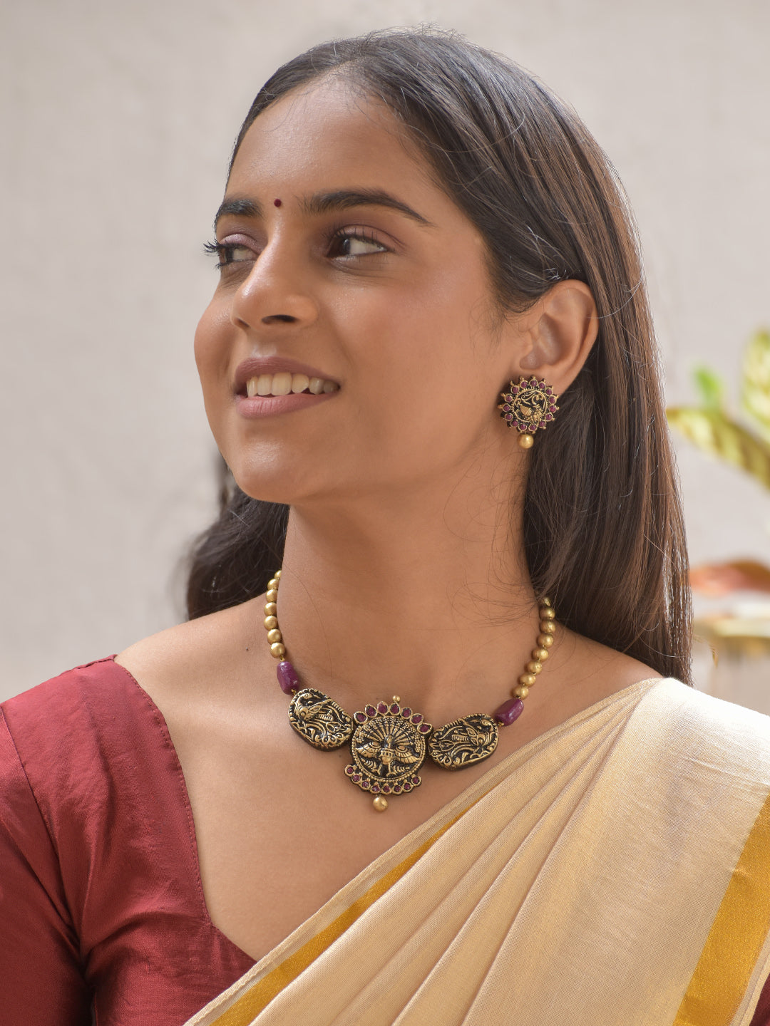 Terracotta Purple Beaded Necklace Set with Sun Peacock Motif & Matching Studs