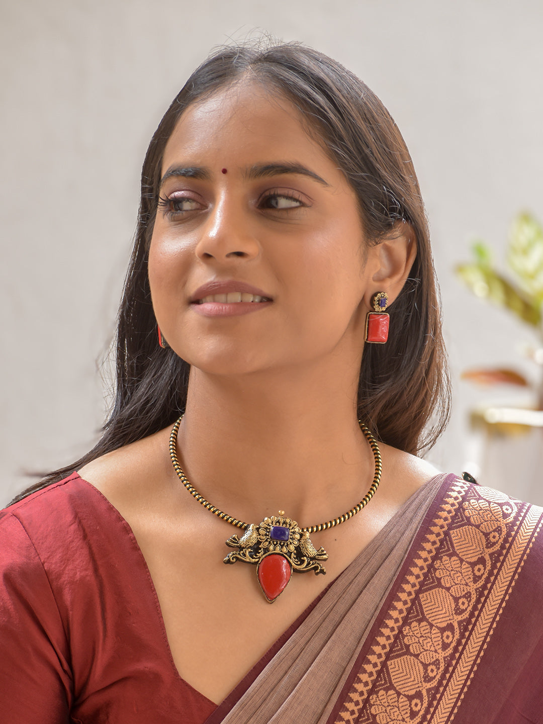 Terracotta Pigeon Pendant Necklace with Red & Blue Accents