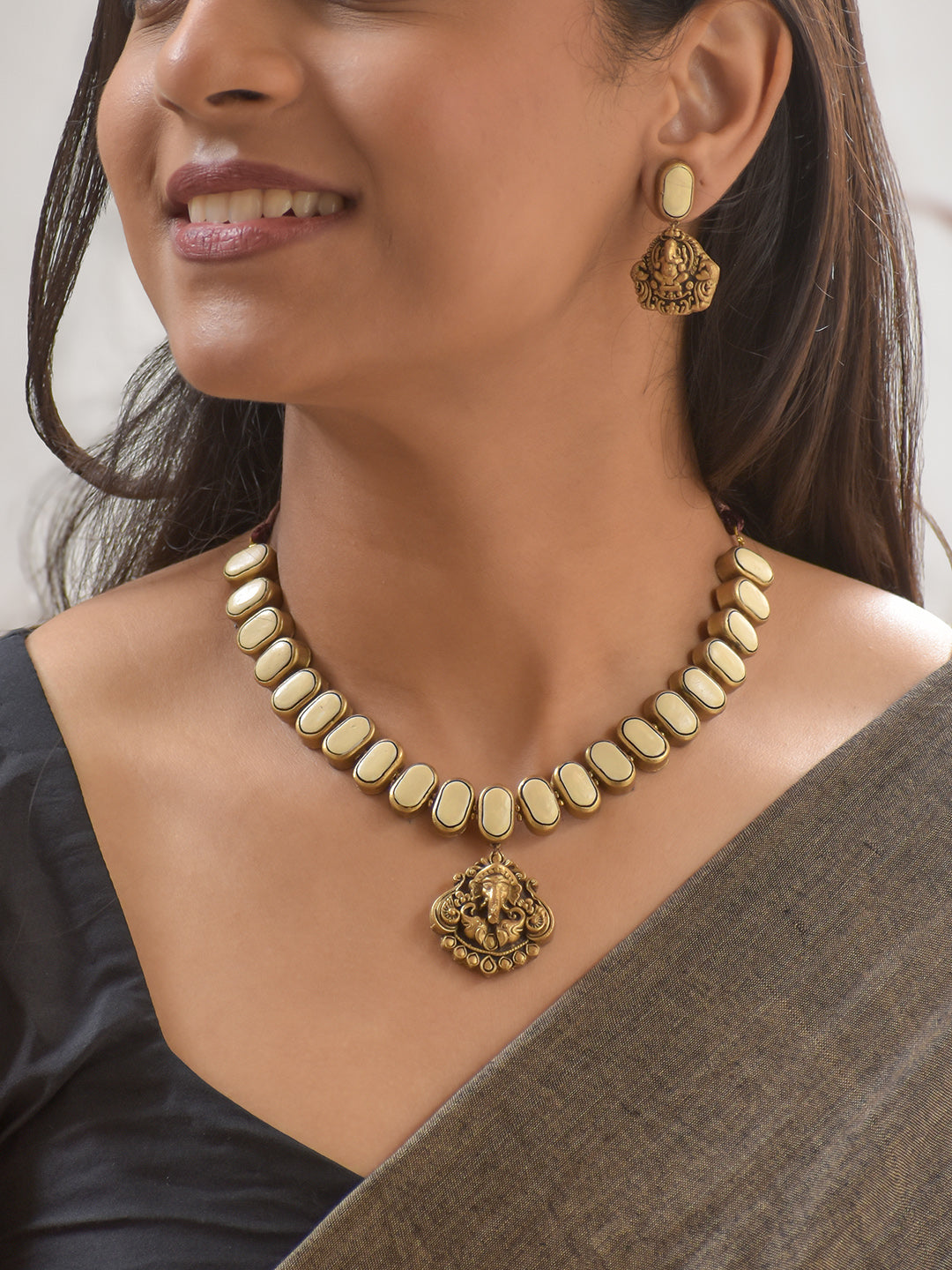 Terracotta White Oval Bead Necklace with Ganesha Pendant & Earrings