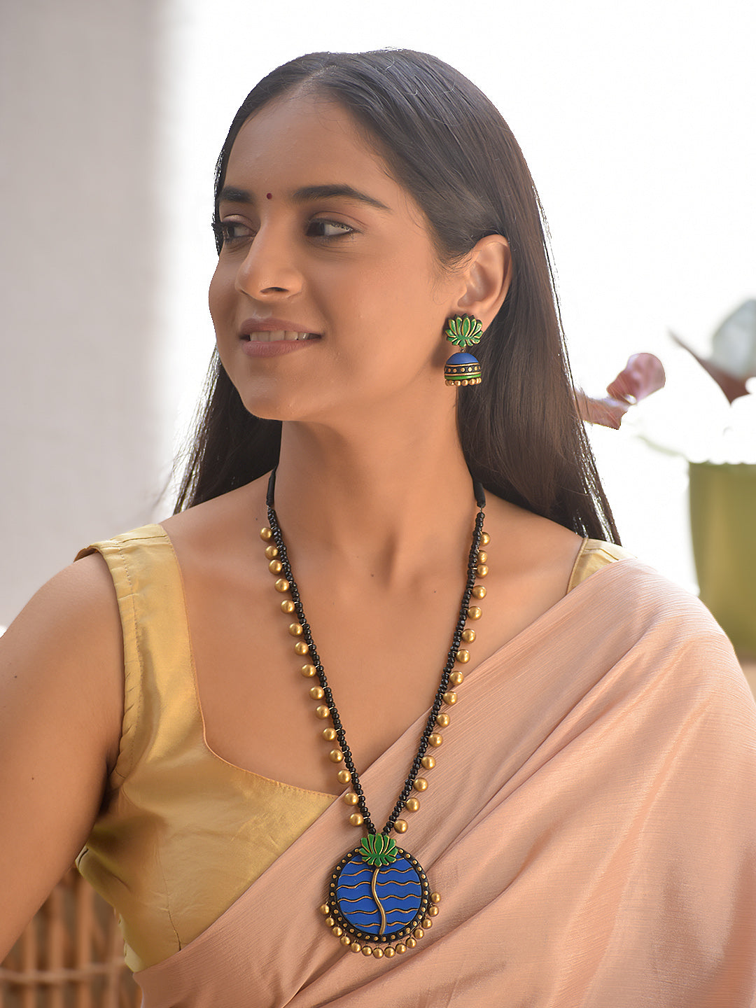 Terracotta Blue Circular Pendant Necklace with Lotus and Wave Motif