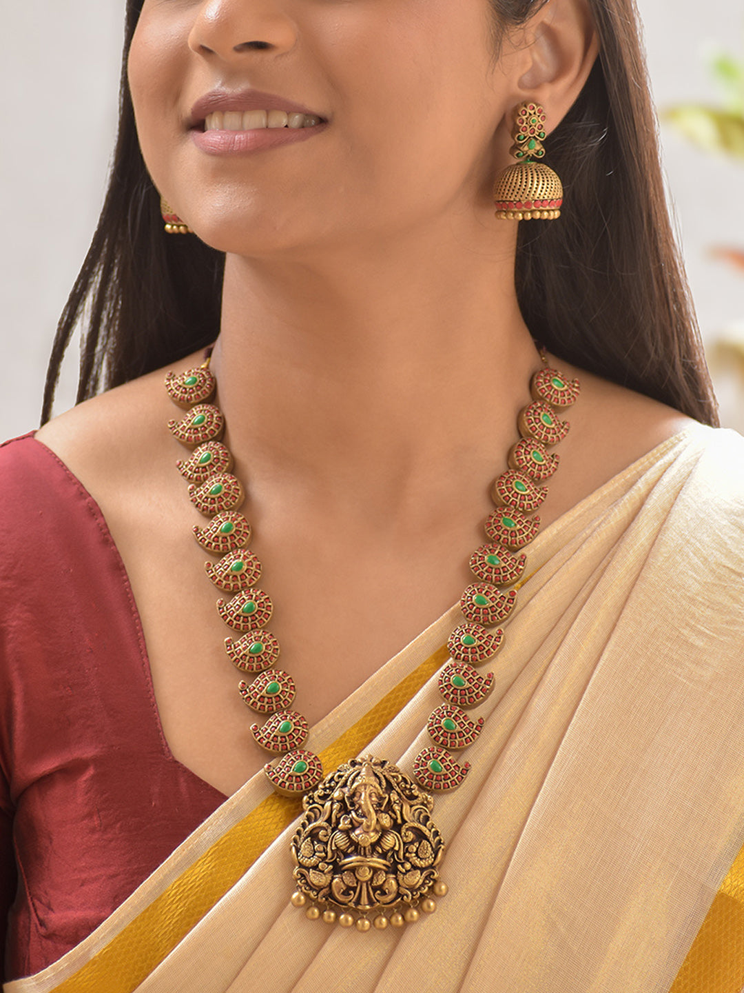 Terracotta Ganesha Pendant Necklace with Paisley Motifs and Earrings