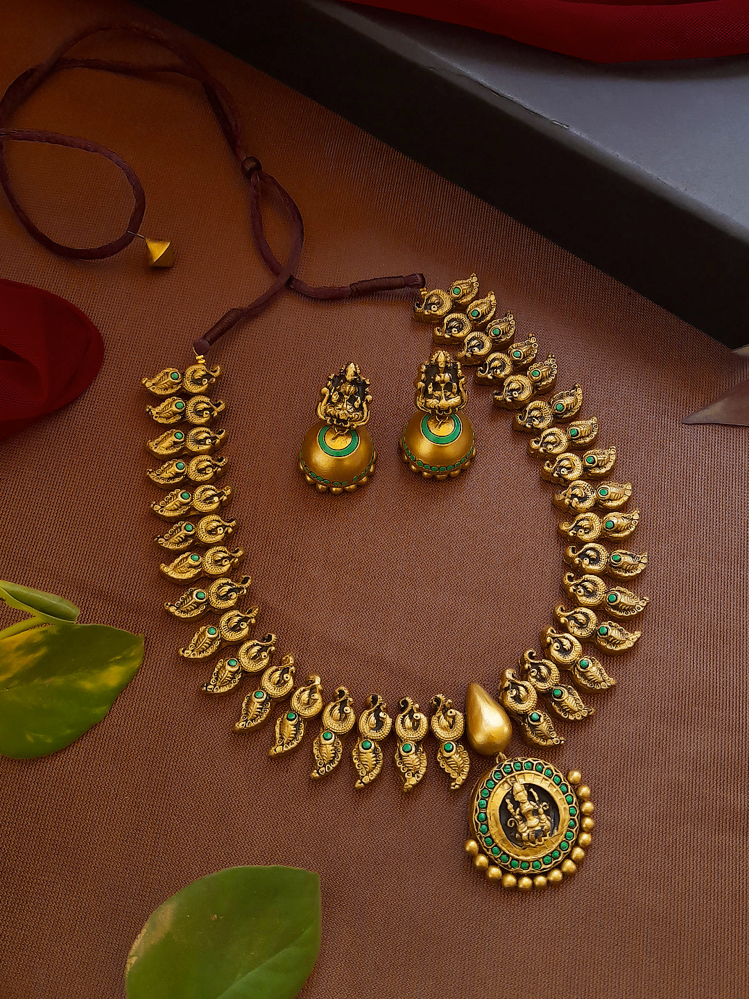 Antique Gold Toned Lakshmi Design Pendant With Peacock Design Motifs Terracotta Necklace Set