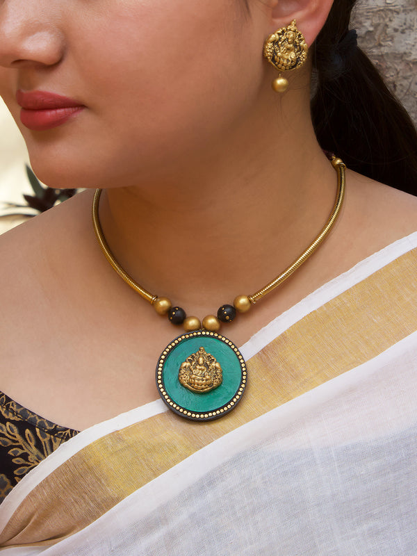 Antique Gold Toned Circular Shape Ganesha Design Pendant Green And Black Color Terracotta Choker Necklace Set