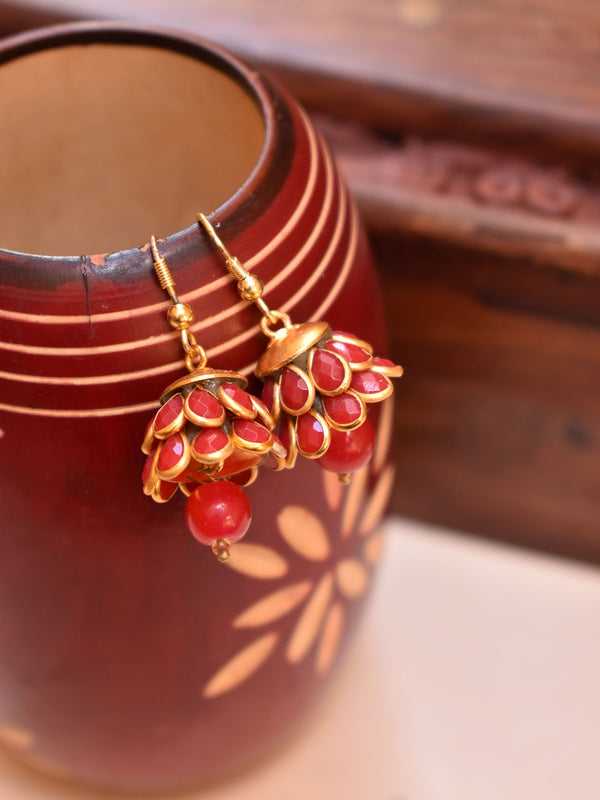 Avismaya Gold Plated Two Layered Tear Drop Design Maroon Color Studded Stones With Hanging Bead Jhumka Earring