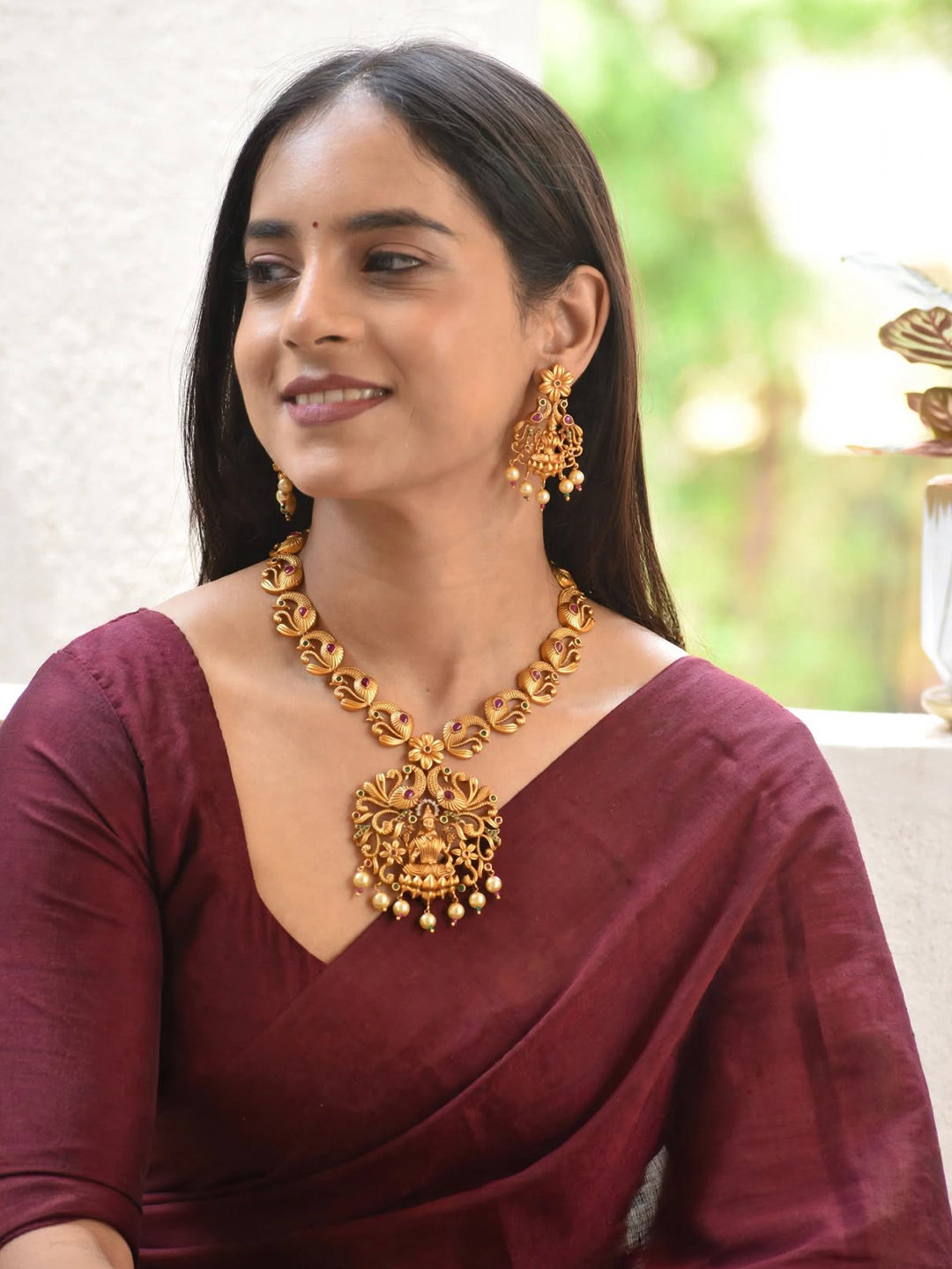 Avismaya Gold Plated Lakshmi And Peacock Design Medium Haar Necklace Set With Kemp Stone