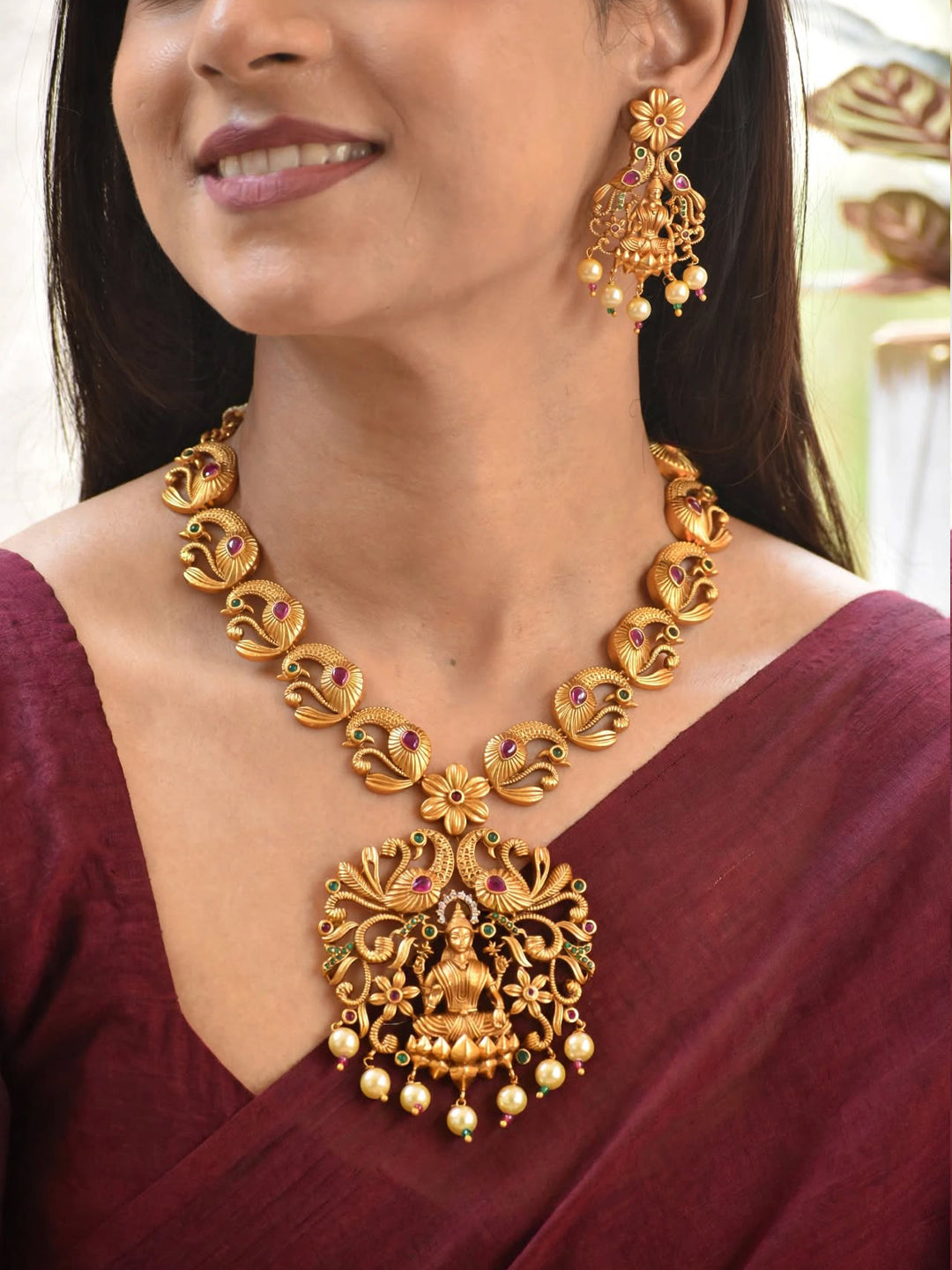 Avismaya Gold Plated Lakshmi And Peacock Design Medium Haar Necklace Set With Kemp Stone