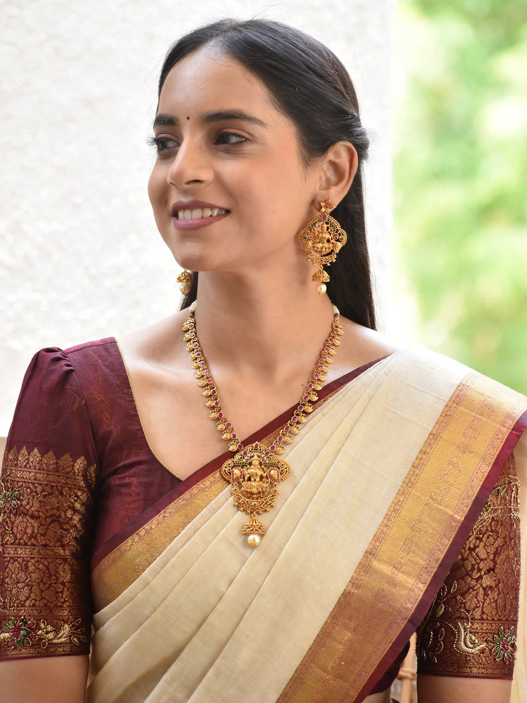 Avismaya Gold Plated Lakshmi Design Medium Haar Necklace Set With Kemp Stones