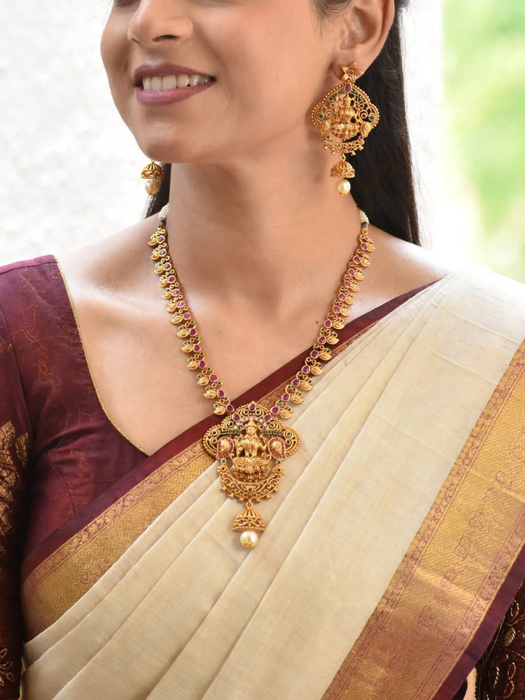 Avismaya Gold Plated Lakshmi Design Medium Haar Necklace Set With Kemp Stones