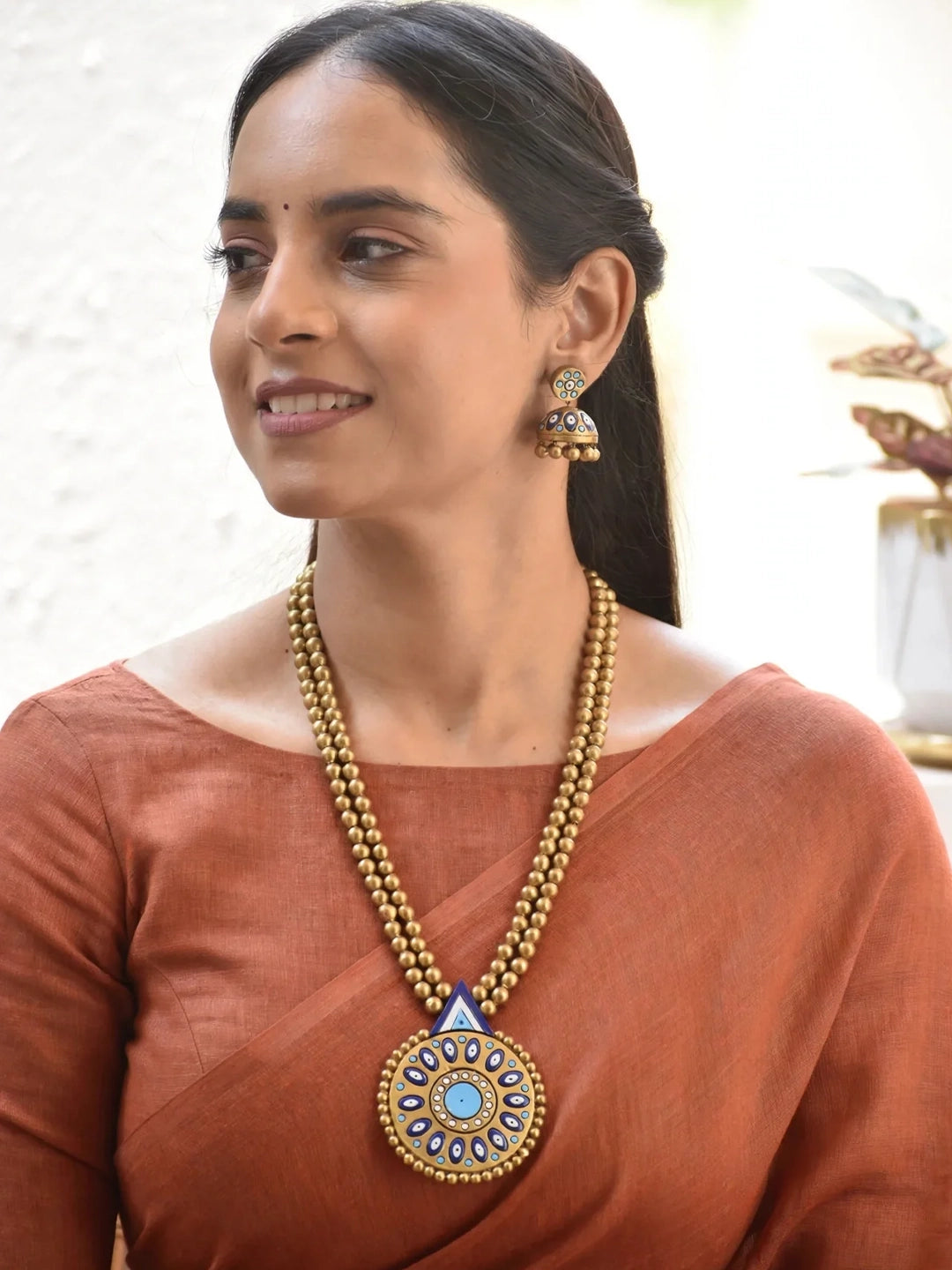Handmade Terracotta Blue Mandala Pendant Necklace with Golden Beads and Matching Jhumka Earrings - Evil Eye