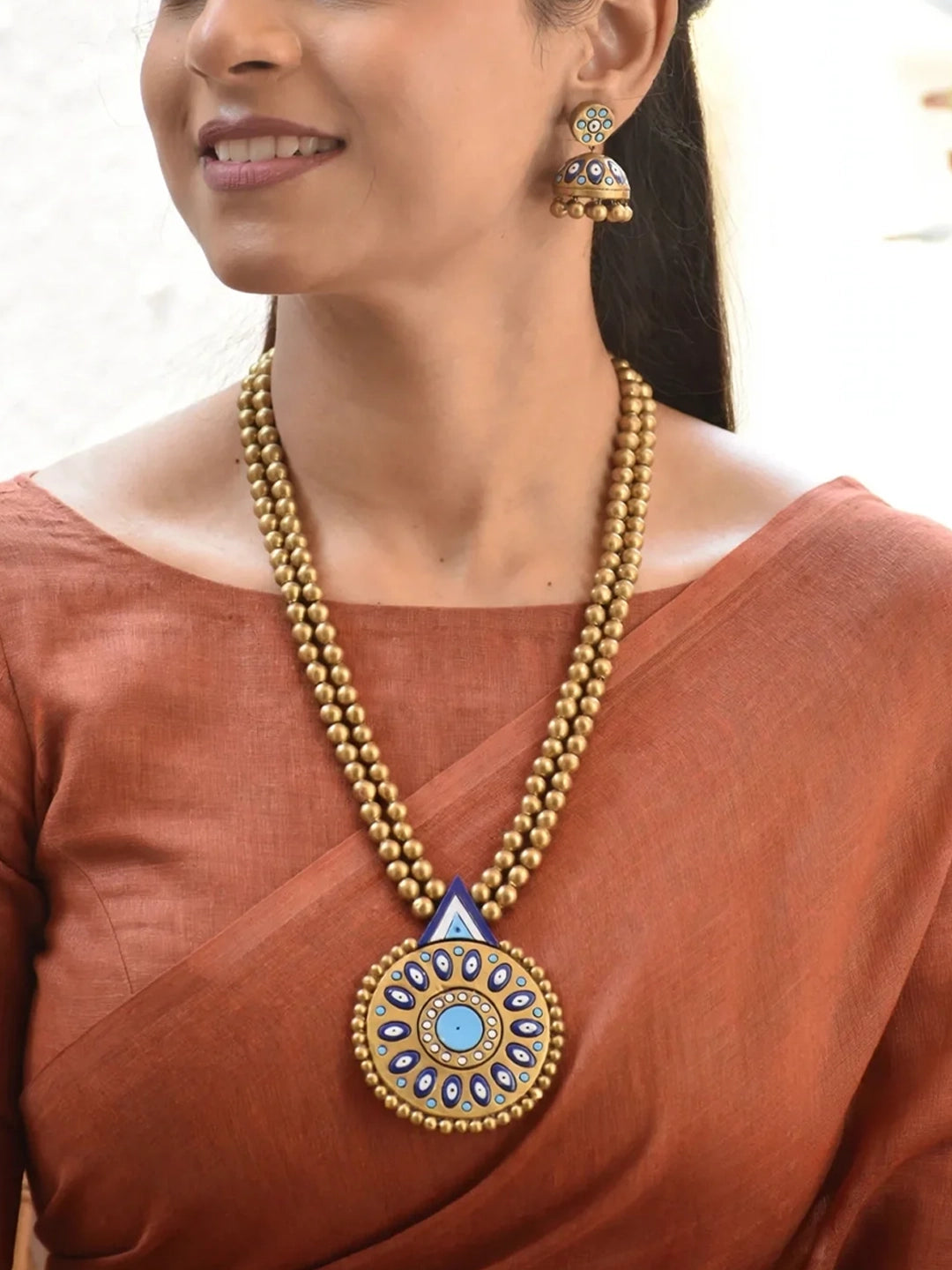 Handmade Terracotta Blue Mandala Pendant Necklace with Golden Beads and Matching Jhumka Earrings - Evil Eye