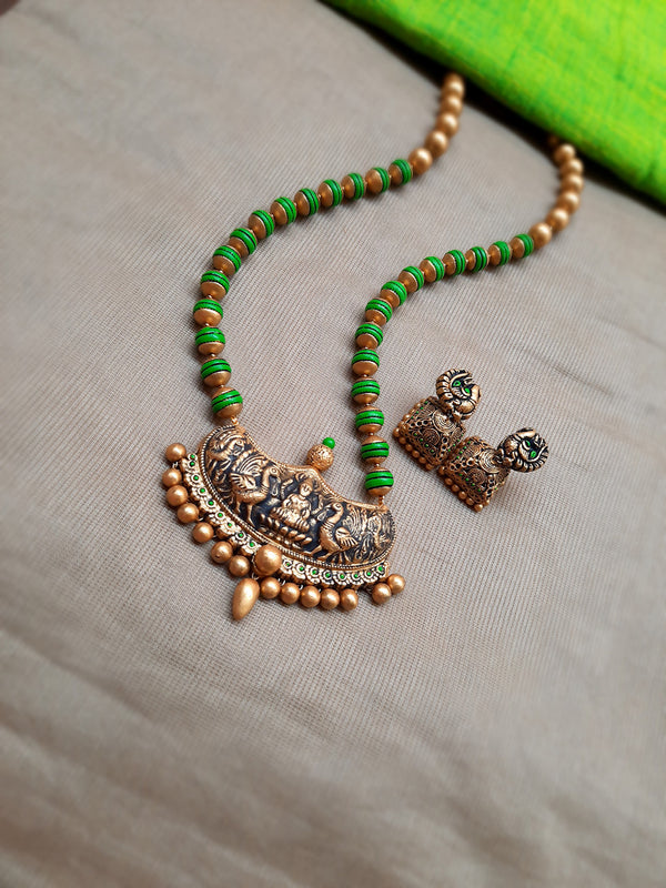 Antique Gold Toned lakshmi Design Pendant With Green Color Beads Terracotta Medium Necklace Set