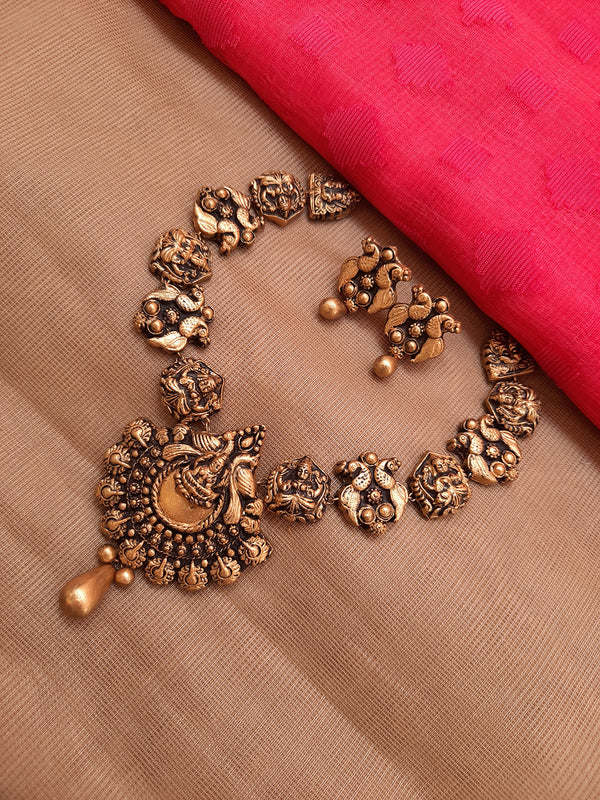 Antique Gold Toned Lakshmi Design Pendant With Peacock Design Motifs Terracotta Choker Necklace Set