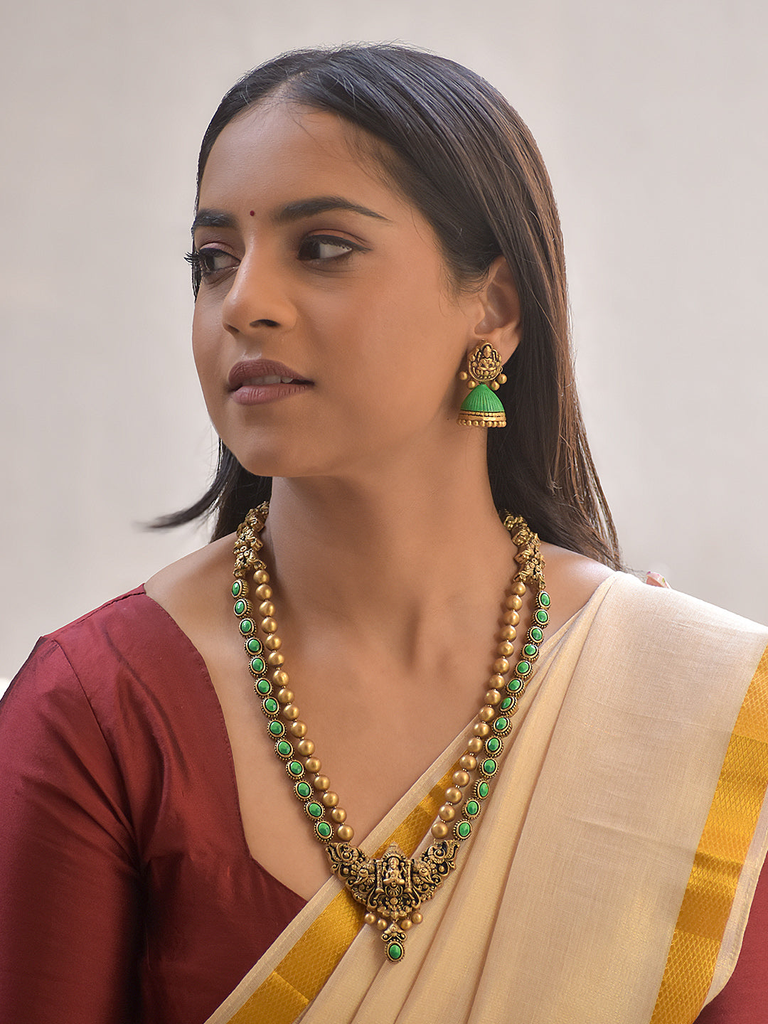 Harinishwari – Terracotta Lakshmi Pendant Long Necklace Set with Green Stone Accents