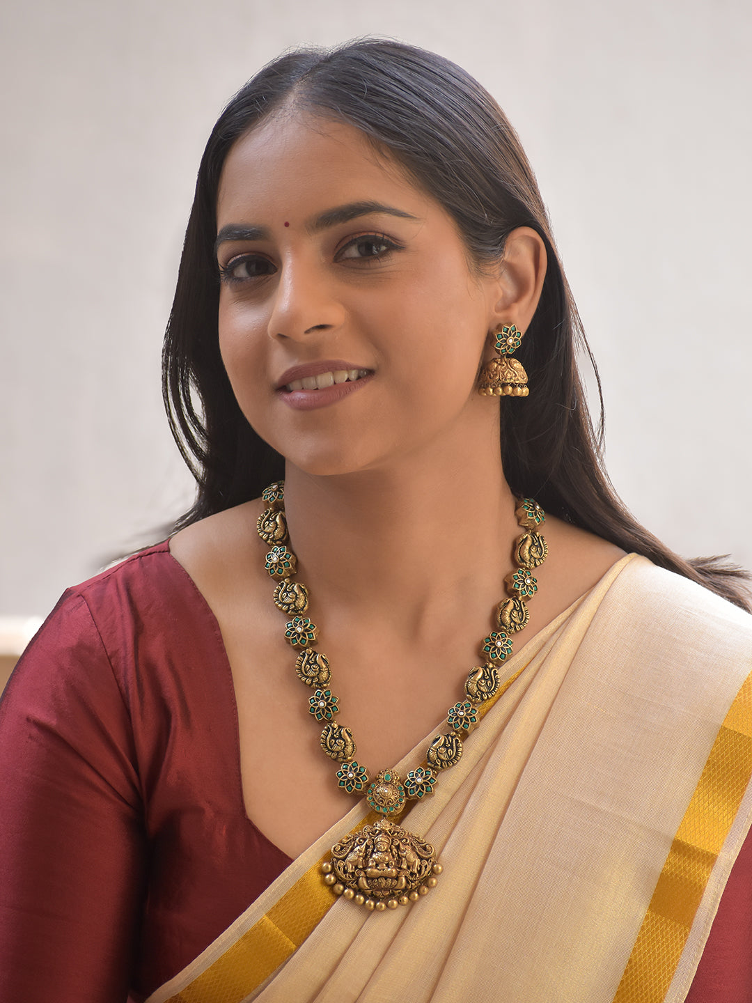 Srilakshya – Handmade Terracotta Lakshmi Pendant Necklace Set with Peacock Motifs and Teal Floral Accents