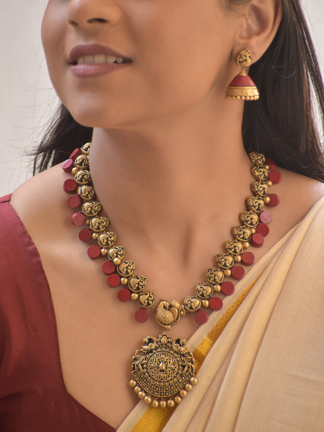 Rudrabali – Handmade Terracotta Temple Necklace Set with Red Disc Beads and Antique Gold Engraved Pendant