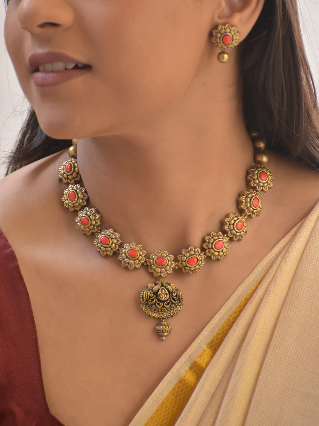 Kusumini – Handmade Terracotta Floral Necklace Set with Orange Color Coral-Toned Stones and Antique Gold Detailing