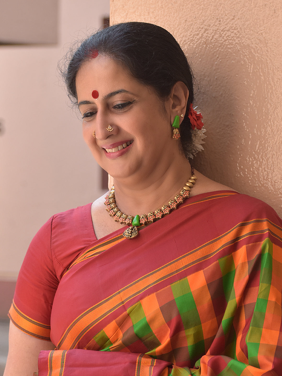 Haram – Terracotta Antique Gold Elephant Motif Necklace with Green Cone Beads & Goddess Pendant