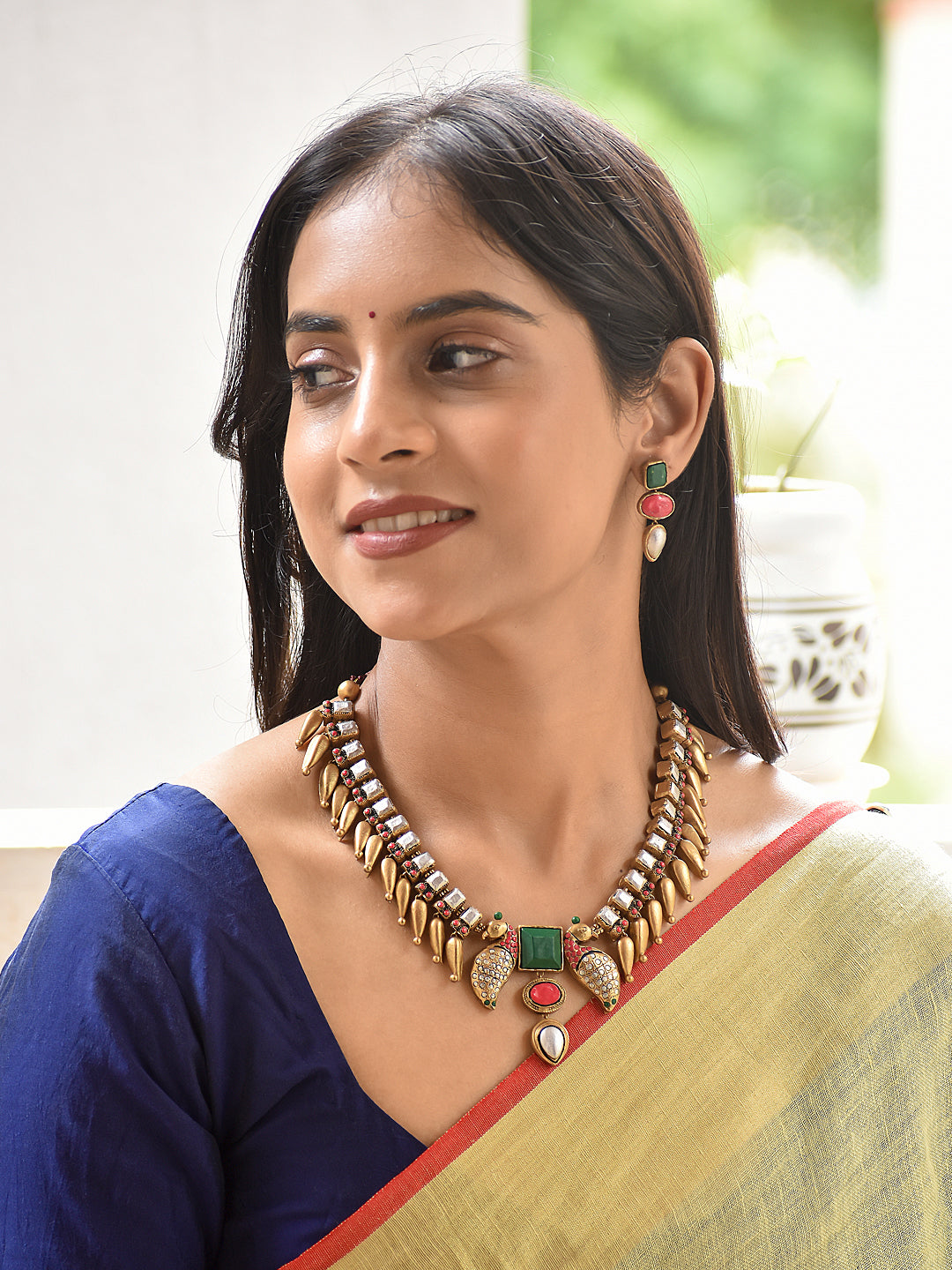 Rajeshwari - queenly goddess Emerald Mirror Peacock Handmade Terracotta Statement Necklace Set