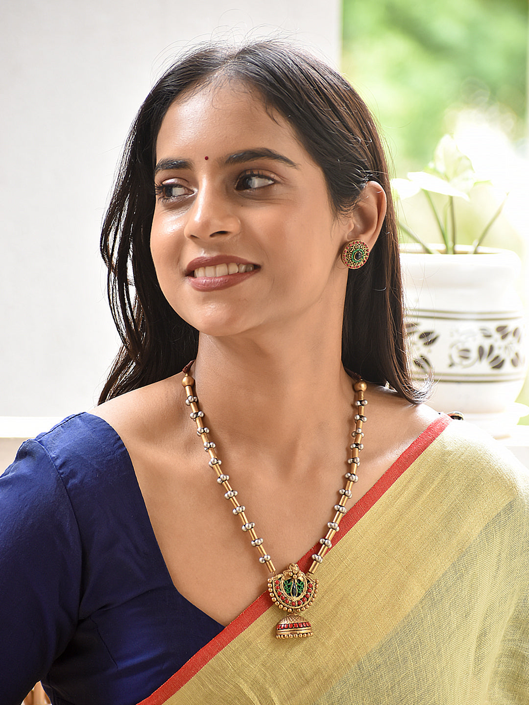 Hiranmayi - made of gold Peacock Jhumka Pendant Handmade Terracotta Long Necklace Set