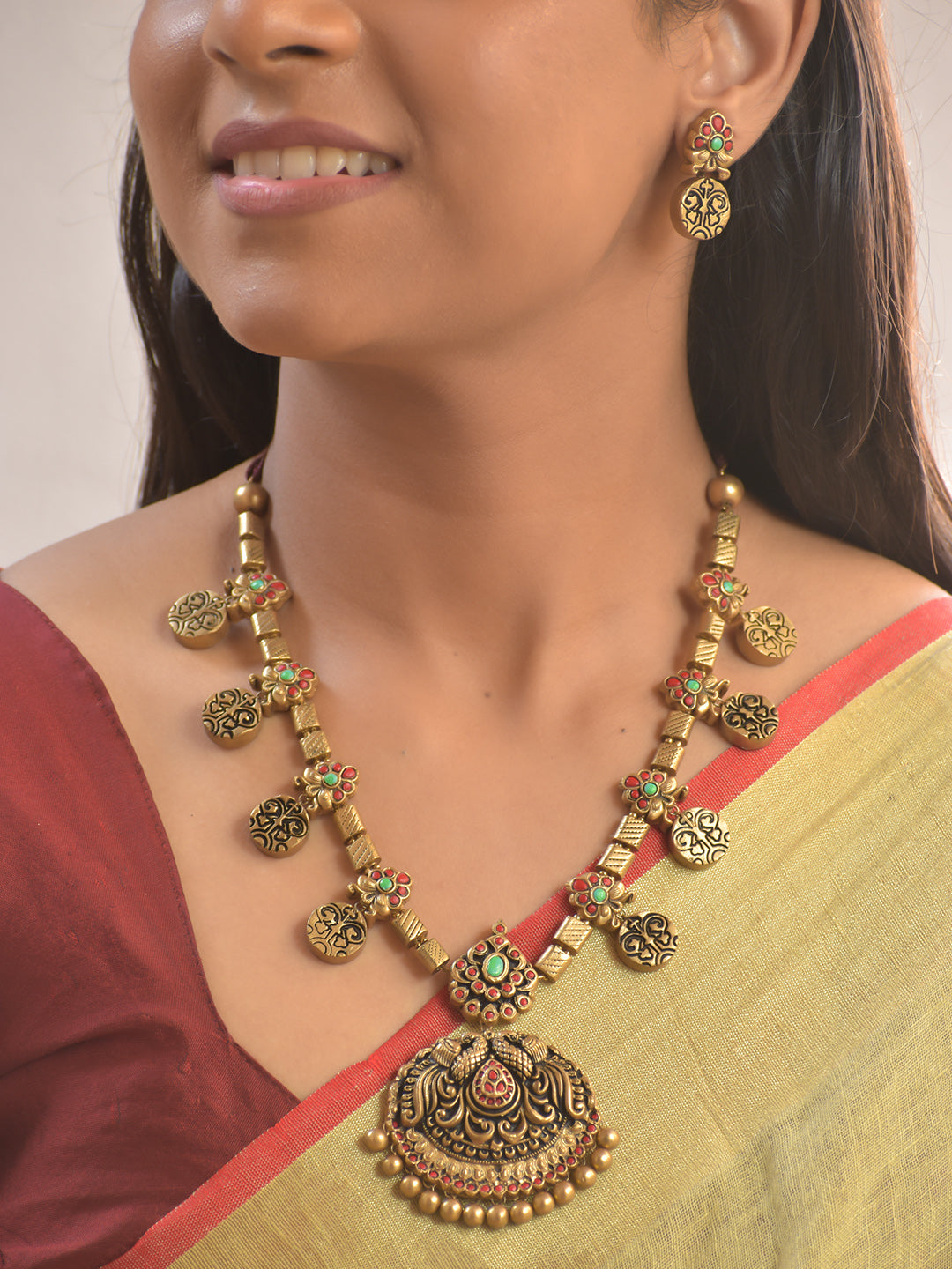 Pratibha Terracotta Peacock Temple Charm Necklace Set With Studs