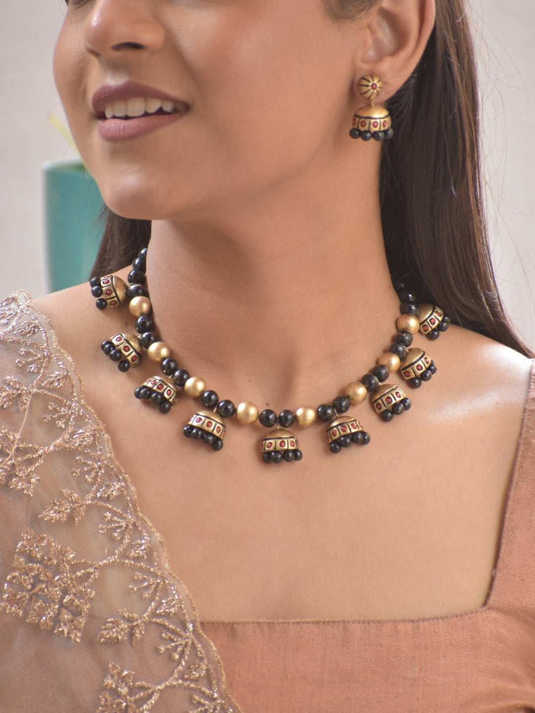 Terracotta Antique Gold Jhumka Necklace Set with Black Beads