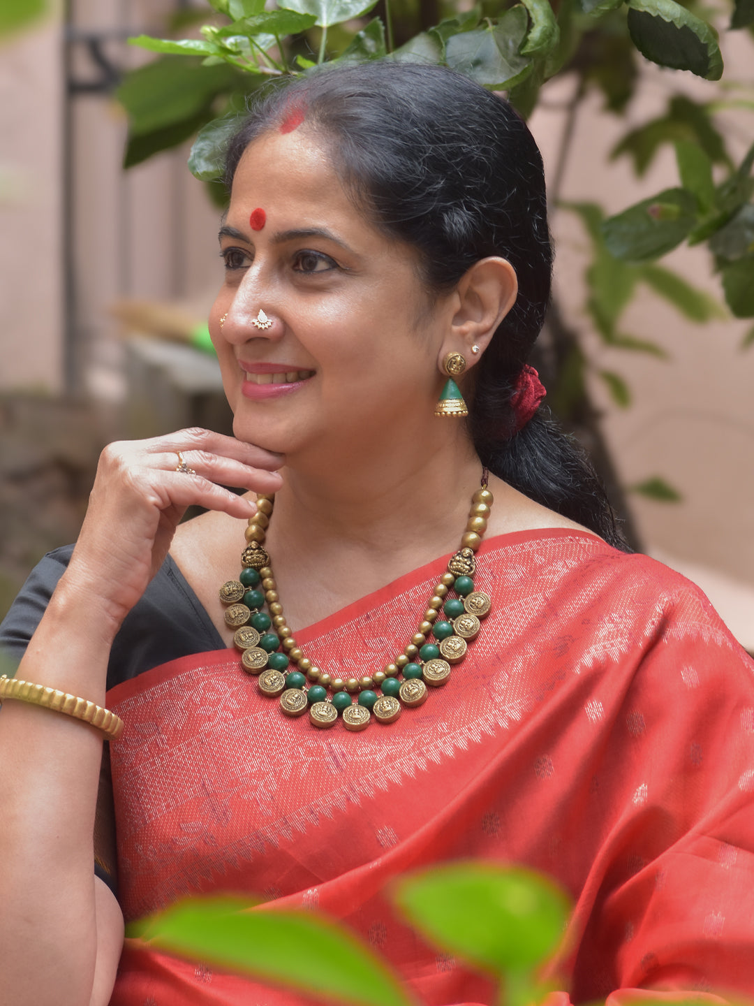 Shringar – Handmade Terracotta Lakshmi Coin Necklace Set with Green Beads and Antique Temple Jhumka Earrings