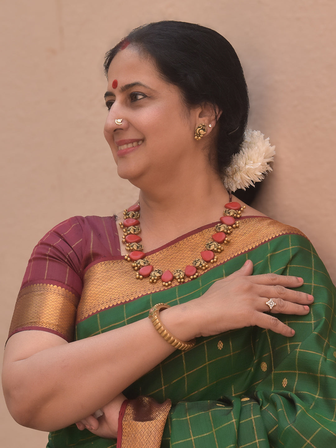 Raktamukhi – Handmade Terracotta Necklace Set with Red Teardrop Beads and Antique Gold Peacock Motifs