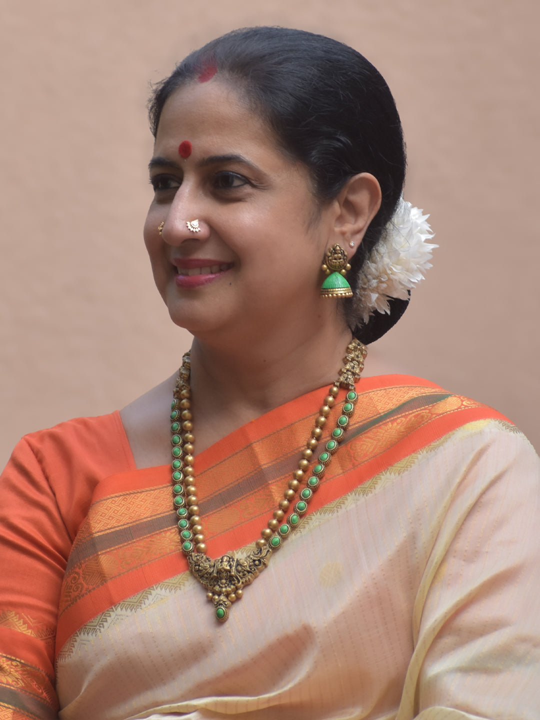 Harinishwari – Terracotta Lakshmi Pendant Long Necklace Set with Green Stone Accents