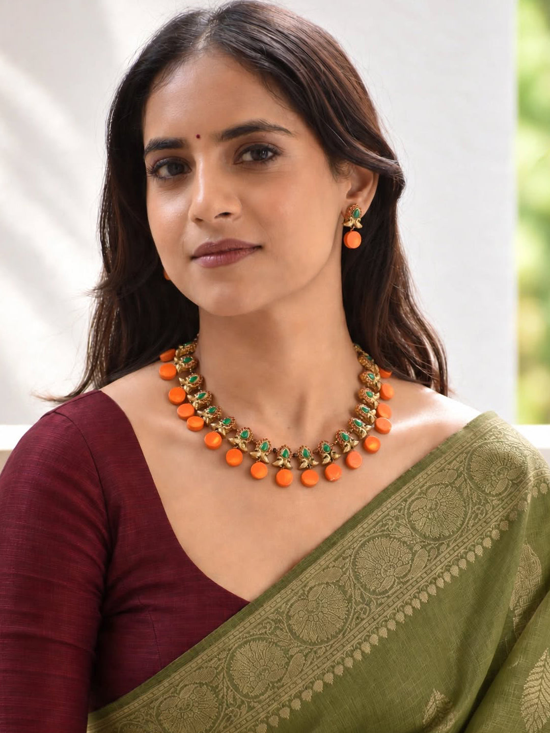 Antique Gold Toned Circular Shape Peacock Design Motifs Red And Green Color Terracotta Choker Necklace Set