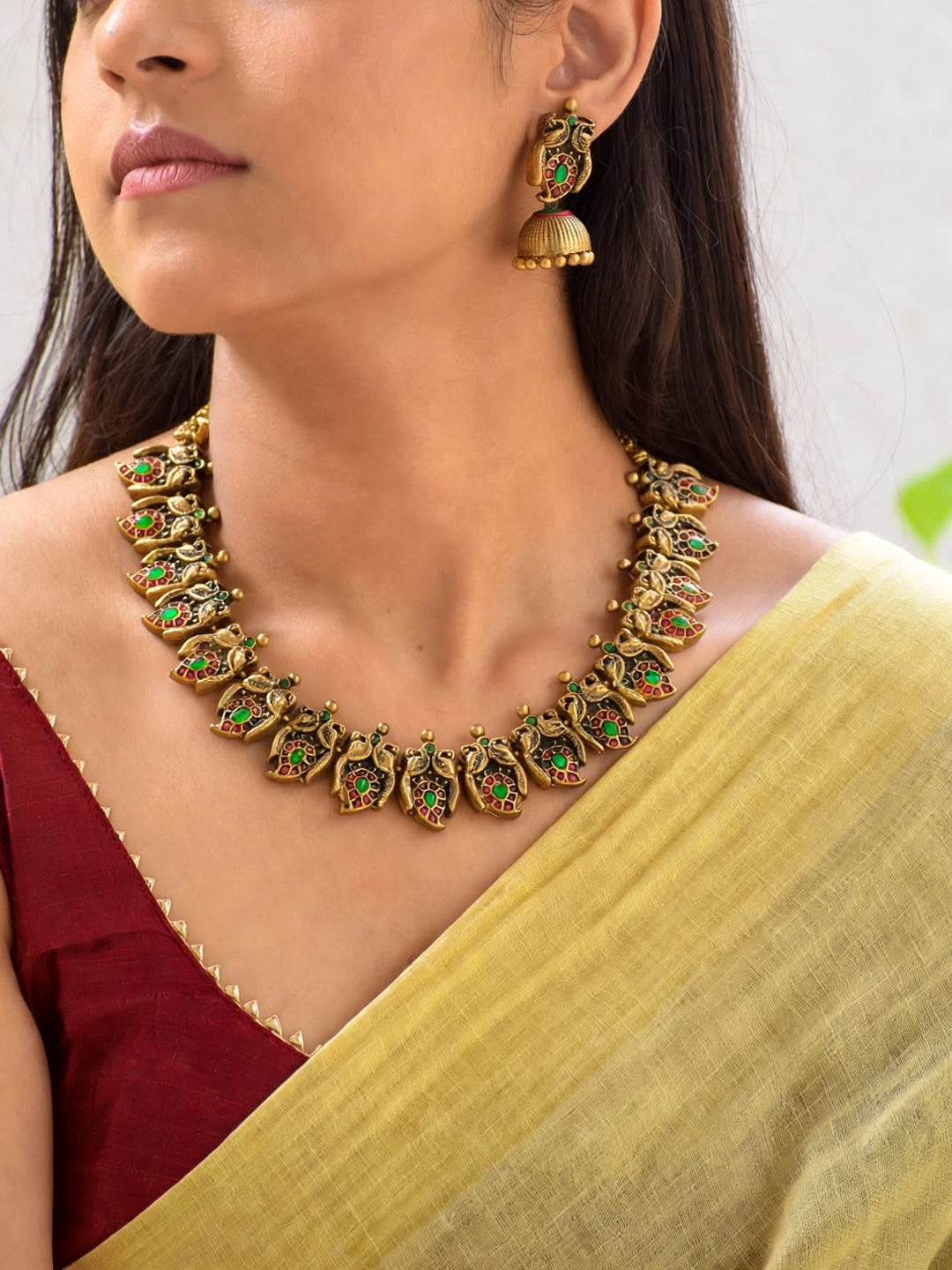Antique Gold Toned Peacock And Mango Design Motifs Terracotta Choker Necklace Set