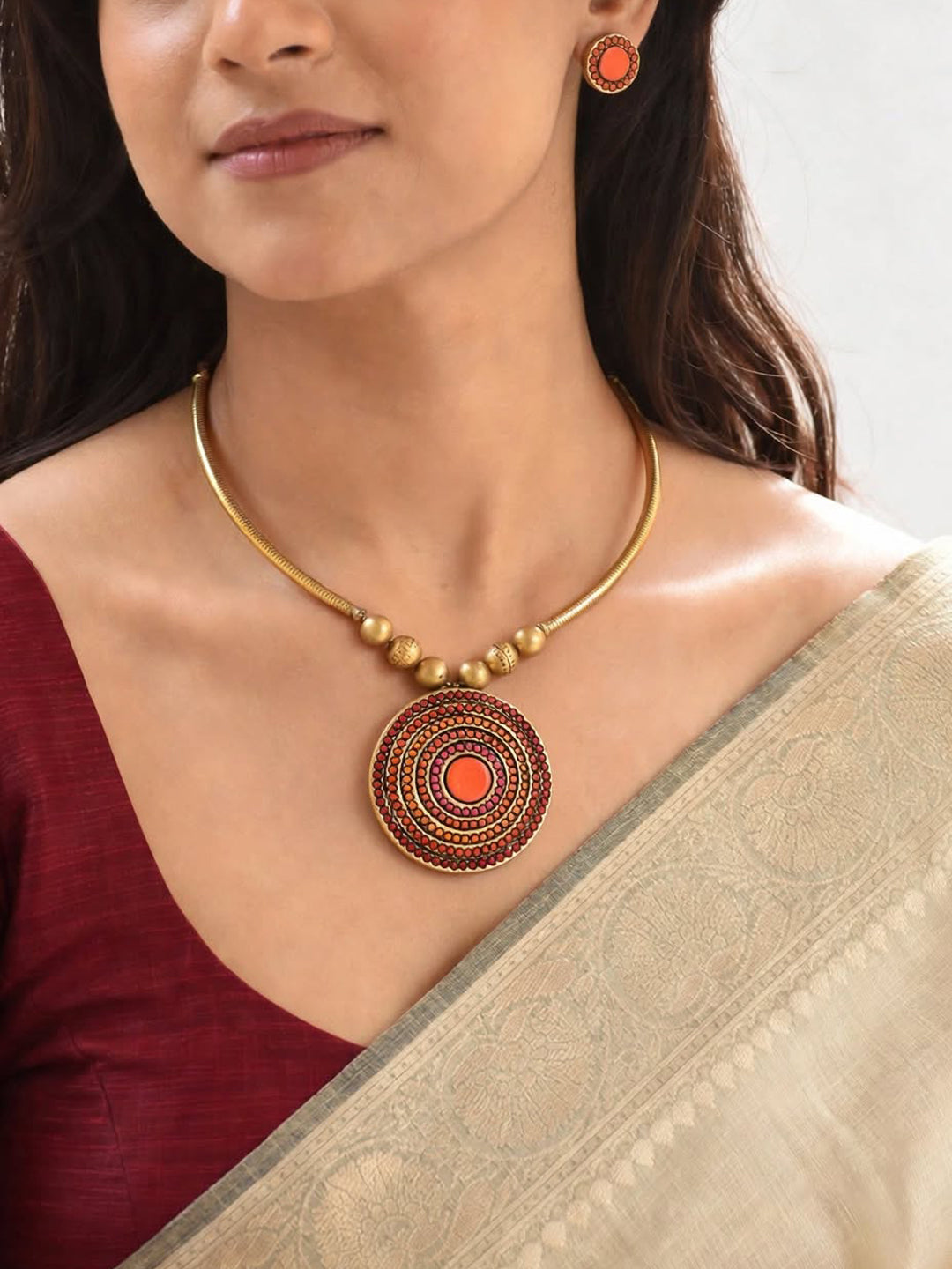 Antique Gold Toned Circular Shape Pendant Red And Pink Color Terracotta Choker Necklace Set