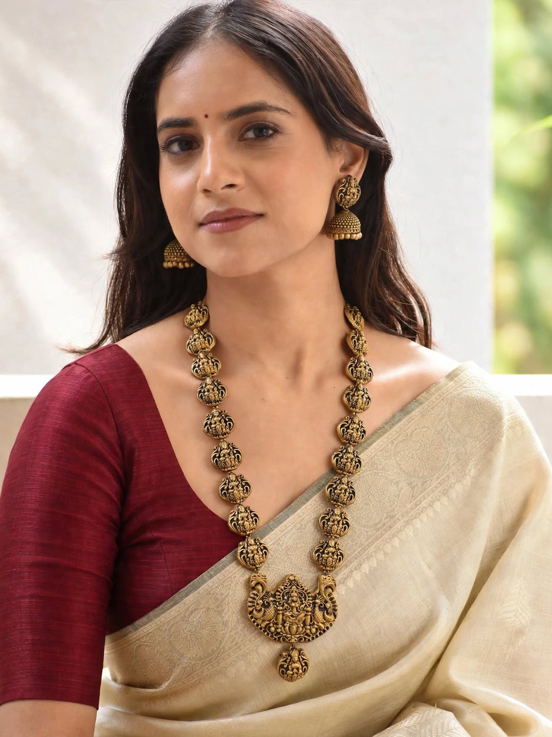 Antique Gold Toned lakshmi Design Pendant With Lakshmi Motifs Terracotta Choker Necklace Set