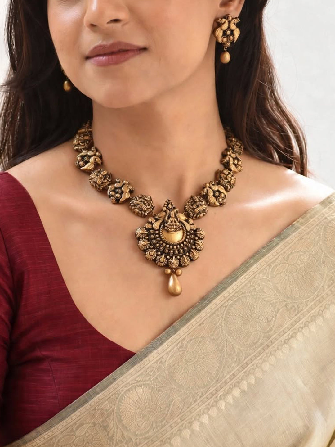 Antique Gold Toned Lakshmi Design Pendant With Peacock Design Motifs Terracotta Choker Necklace Set