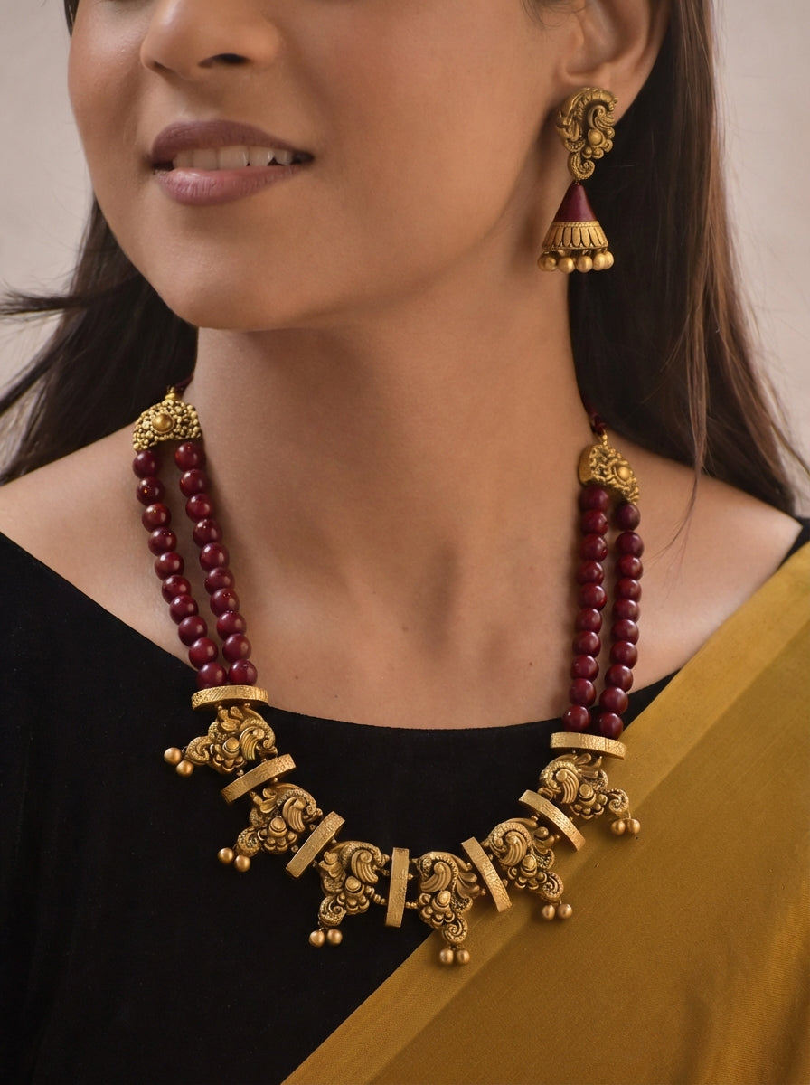 Hemangi – Terracotta Temple Necklace Set with Maroon Strands and Antique Peacock Motifs