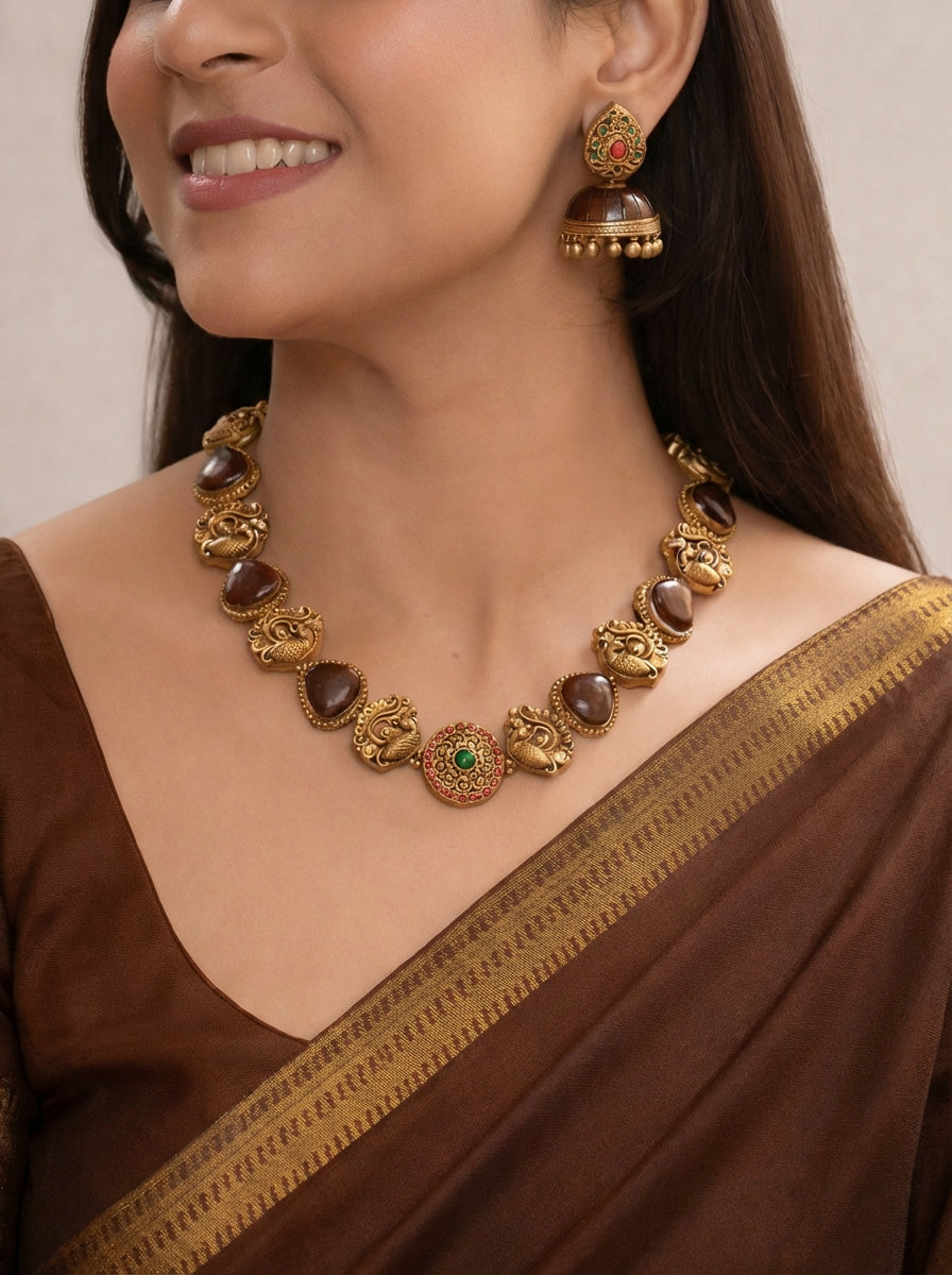 AurumDhara 🤎 — Brown Terracotta Statement Necklace Set with Antique Gold Peacock Motifs & Heritage Jhumkas
