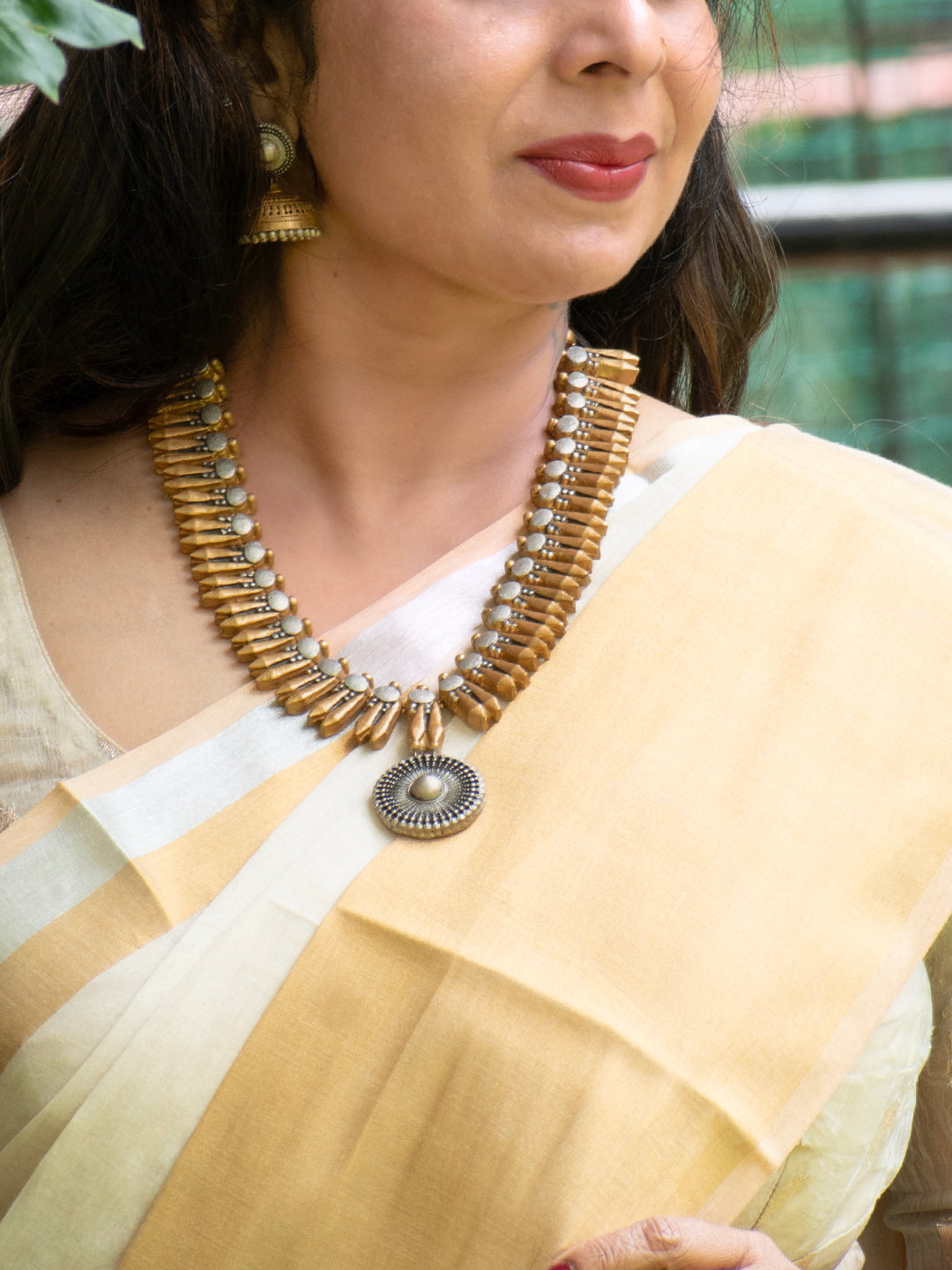 Aalaya - temple, abode Pearl Medallion Antique Statement Necklace Set