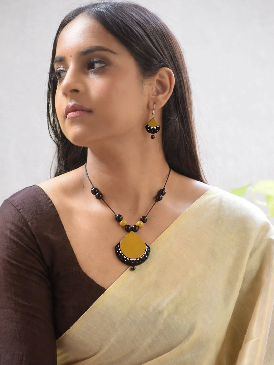 Aavya – Handmade Mustard & Black Pendant Necklace Set