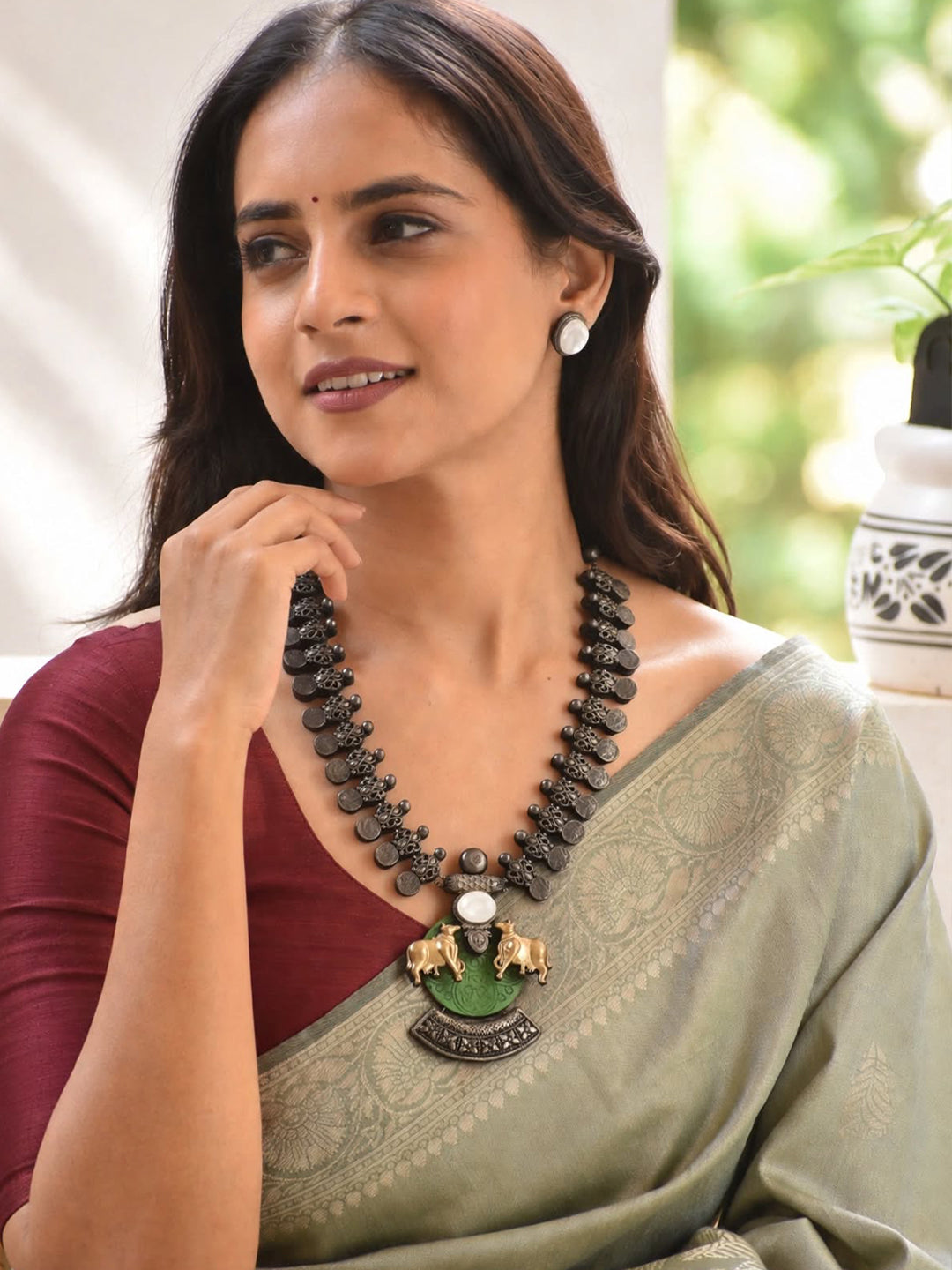 Shyamali – Handmade Green, Pearl & Oxidised Black Twin Cow Necklace Set