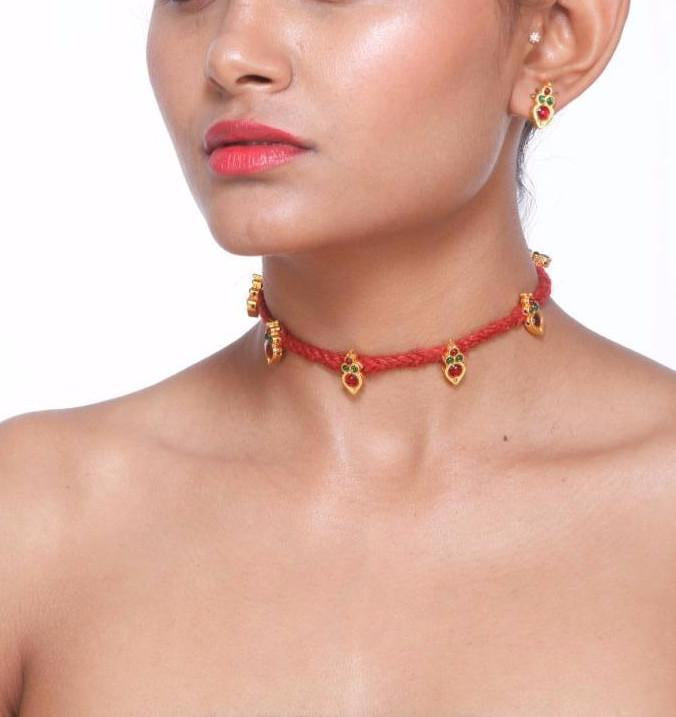 Red Choker With V Shaped Motifs And Earrings