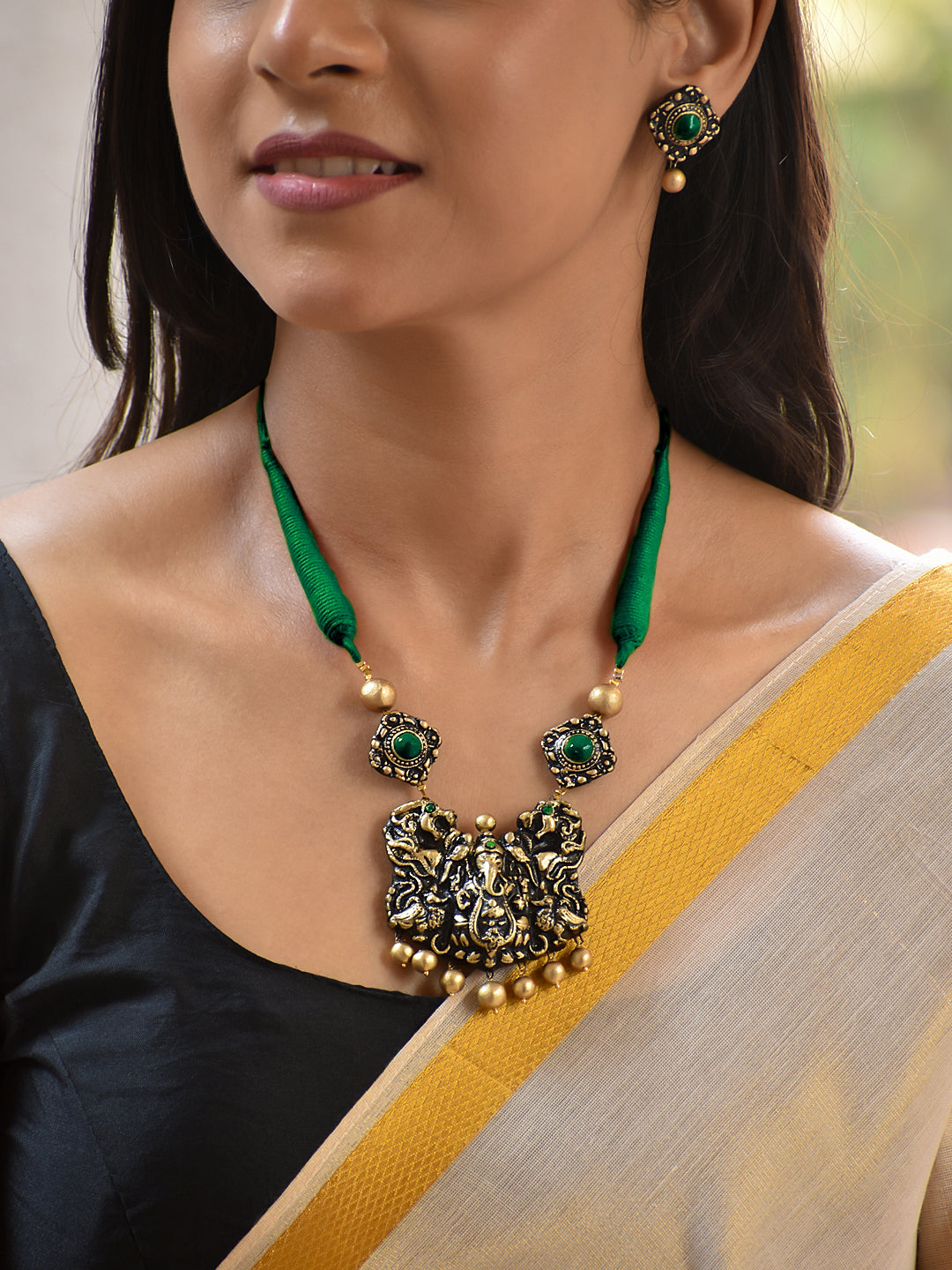 Terracotta Temple Motif Necklace with Deep Green Thread Cord