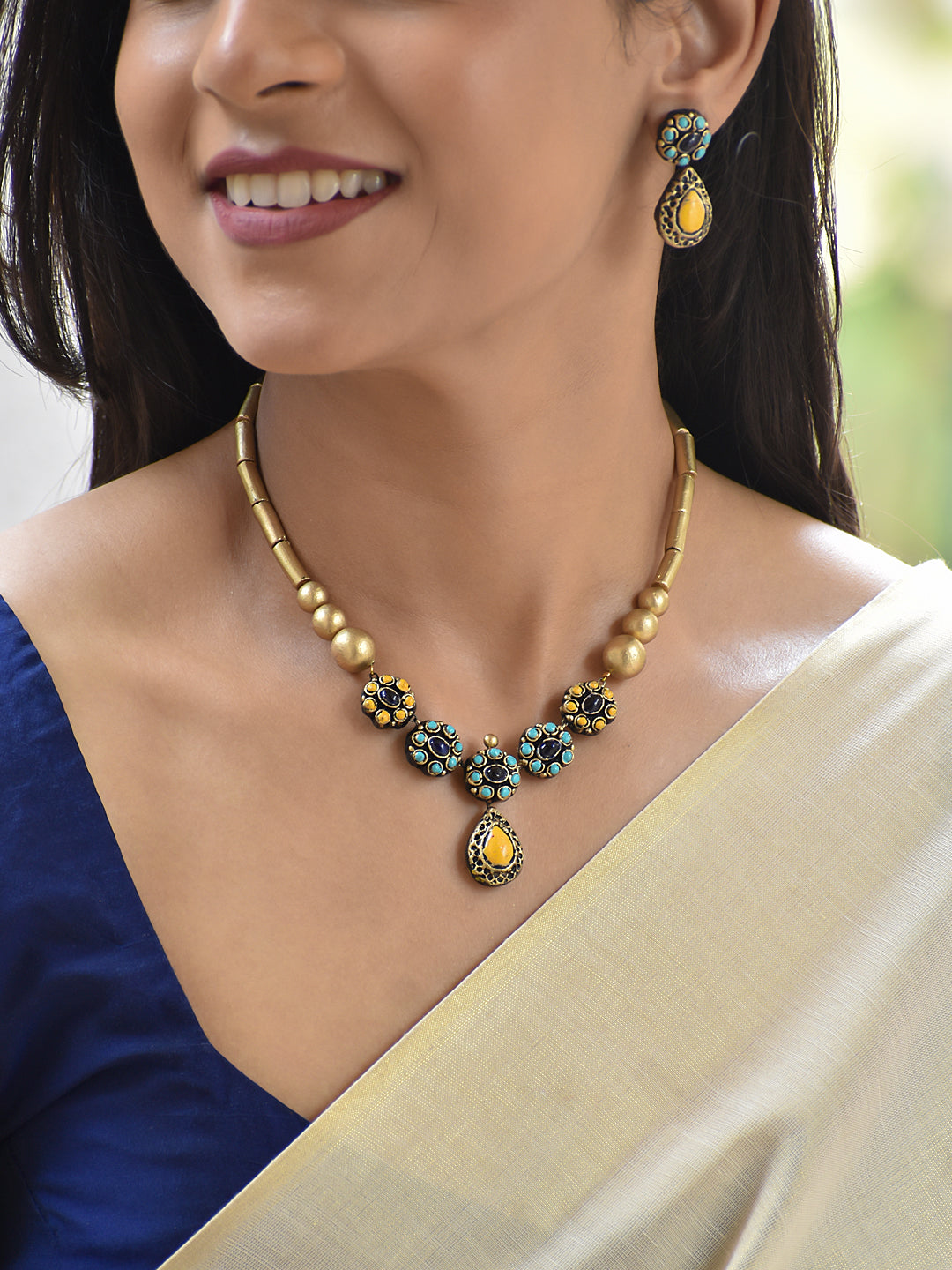 Terracotta Circular Stone Necklace with Teardrop Pendant