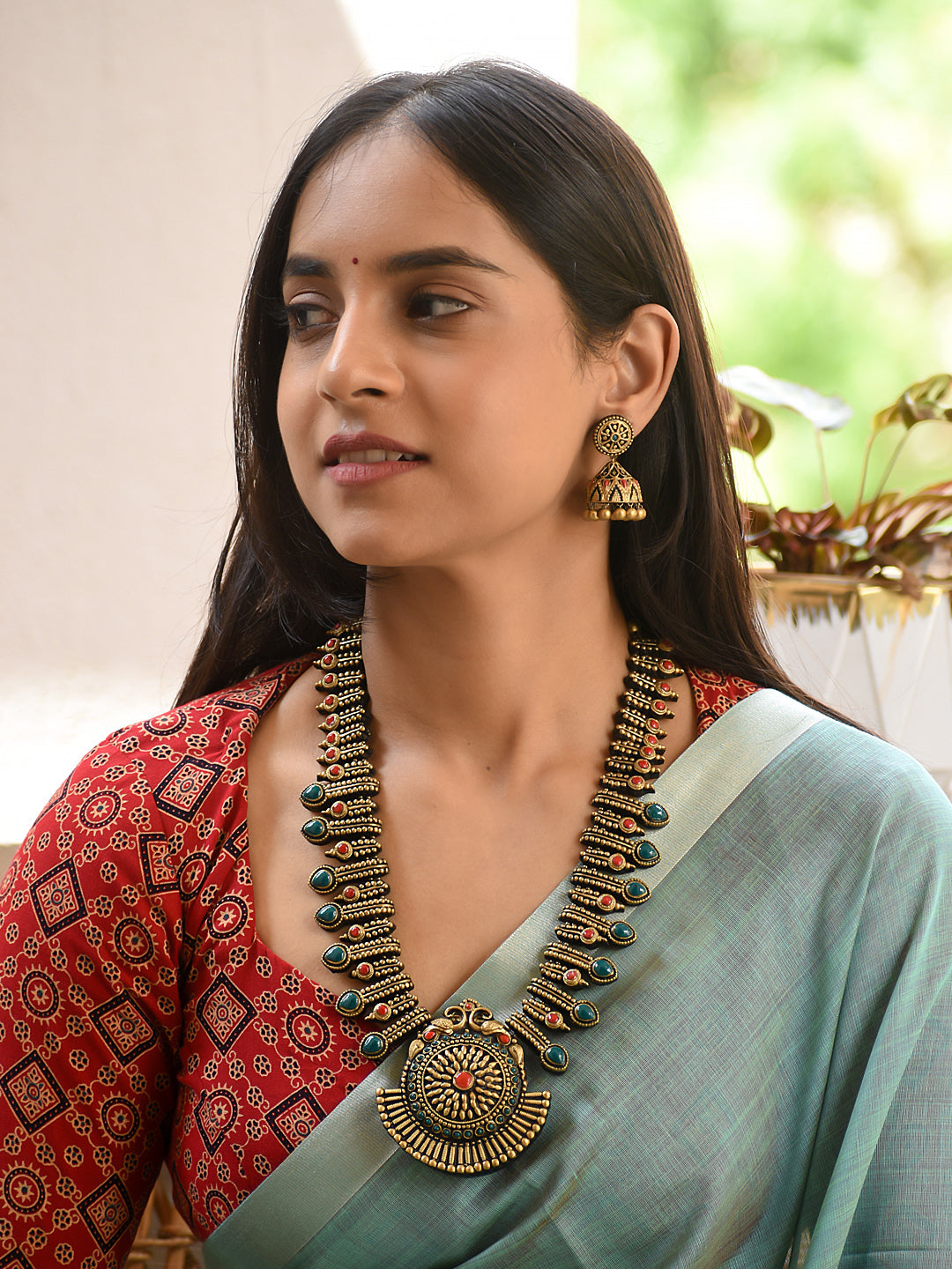 Terracotta Statement Necklace with Layered Motifs and Round Pendant