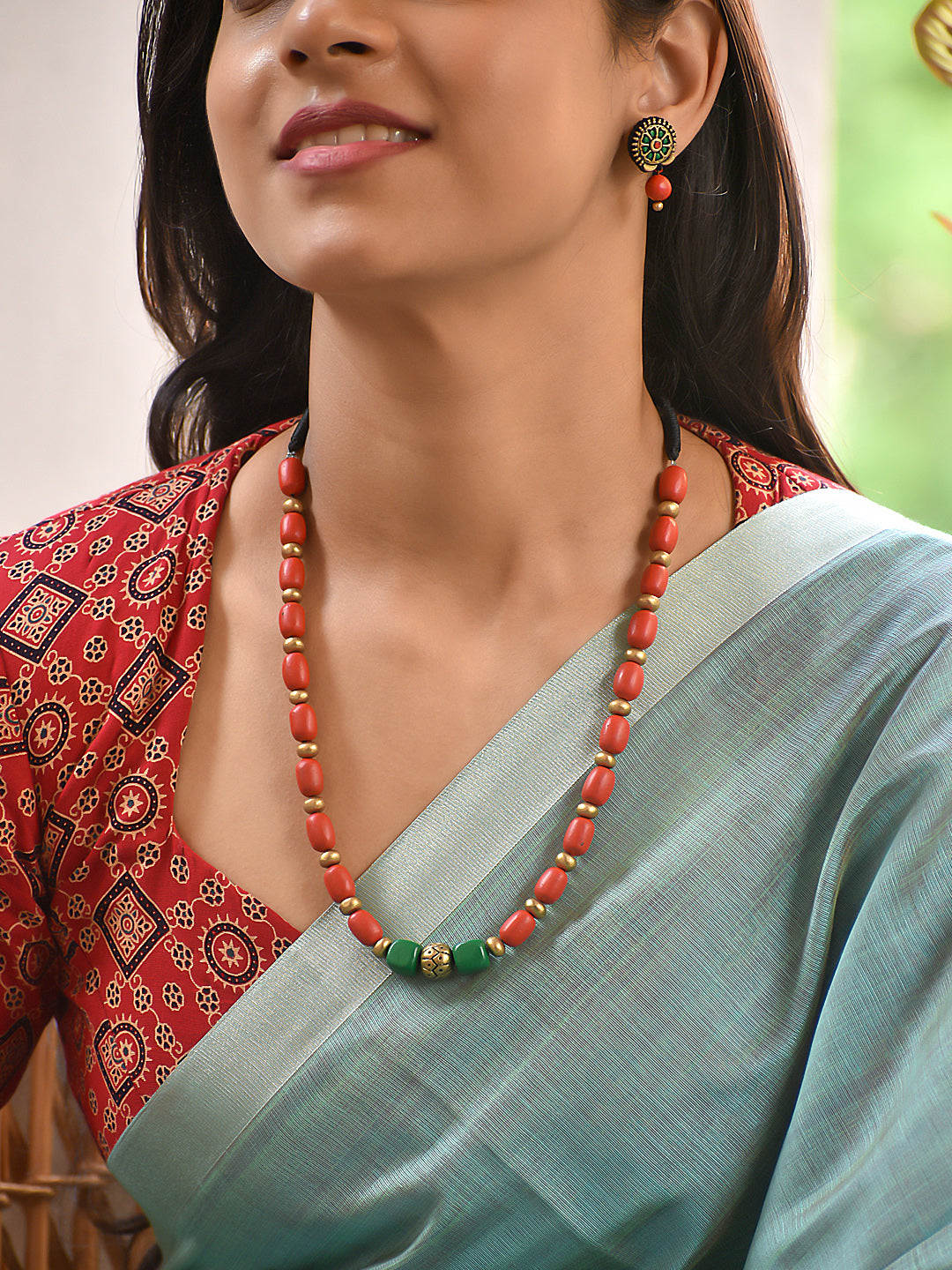 Terracotta Coral Bead Necklace with Green Accent Center